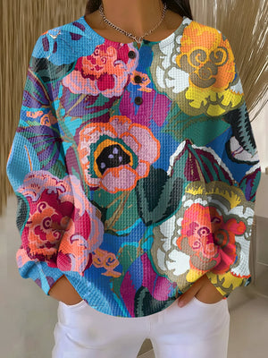 SIMA | SWEATER WITH LARGE COLORFUL FLOWERS